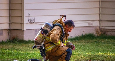 Firefighter Kneeling